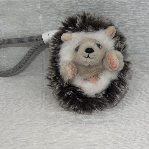 Realistic baby hedgehog tuck away feet 